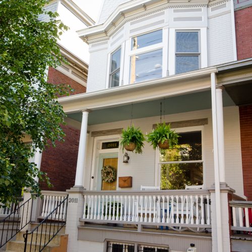 row home exterior painted exterior brick