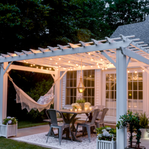 white pergola with cafe lights